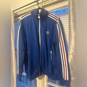 Blue adidas Beckenbauer track jacket.